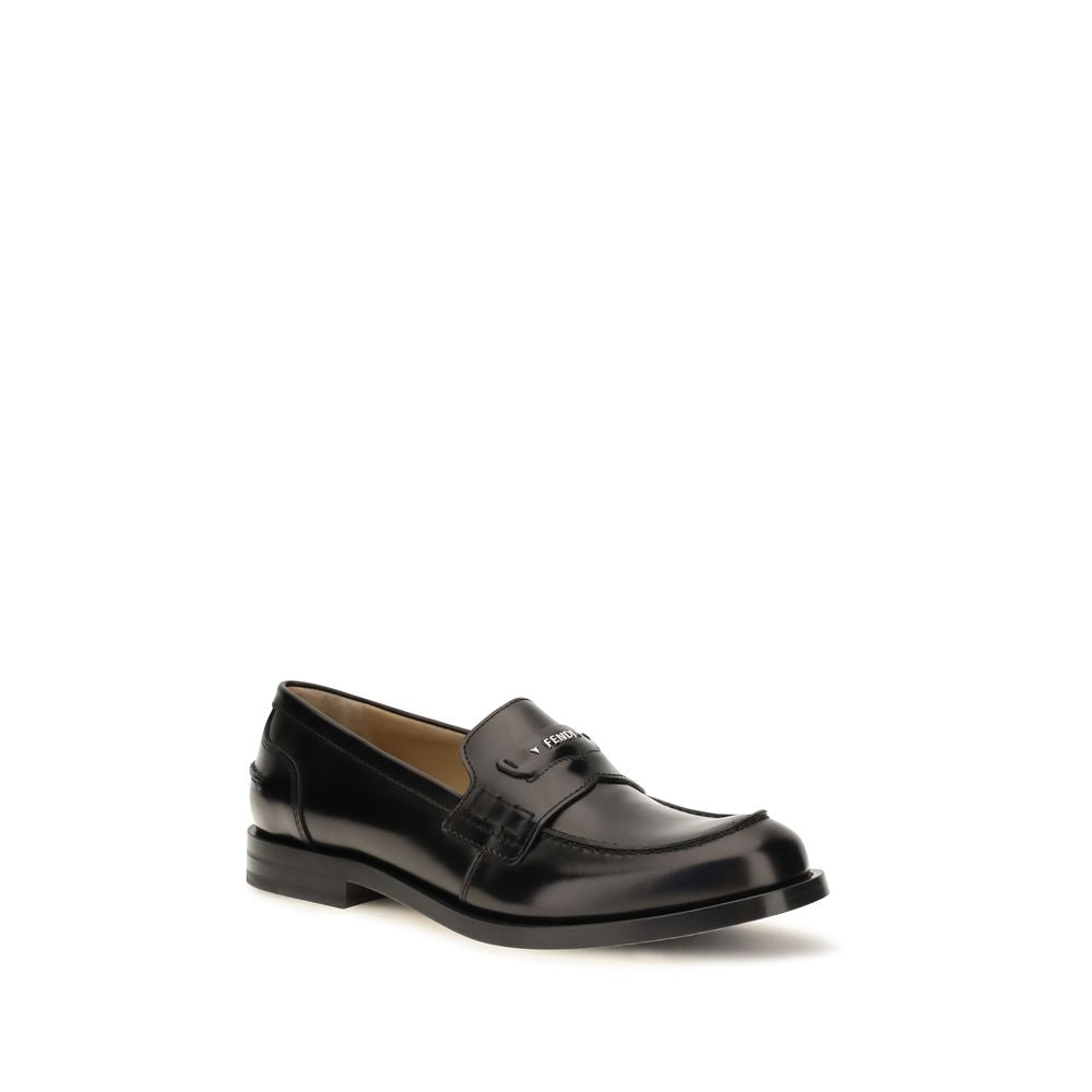 Loafer Slip-On Strap Shoes by Fendi for men in bos taurus calfskin leather & palladium black & palladium features an ergonomic silhouette, perfectly showcasing College Men's Bos Taurus Calfskin Leather & Palladium Loafer Slip-On Strap Shoes with its distinct and elegant .