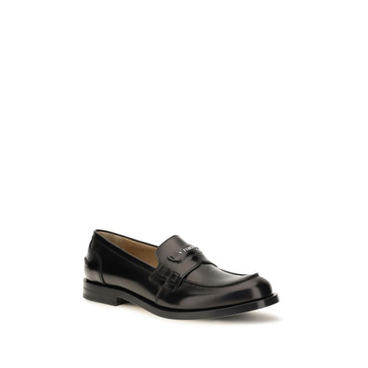 Loafer Slip-On Strap Shoes by Fendi for men in bos taurus calfskin leather & palladium black & palladium features an ergonomic silhouette, perfectly showcasing College Men's Bos Taurus Calfskin Leather & Palladium Loafer Slip-On Strap Shoes with its distinct and elegant .