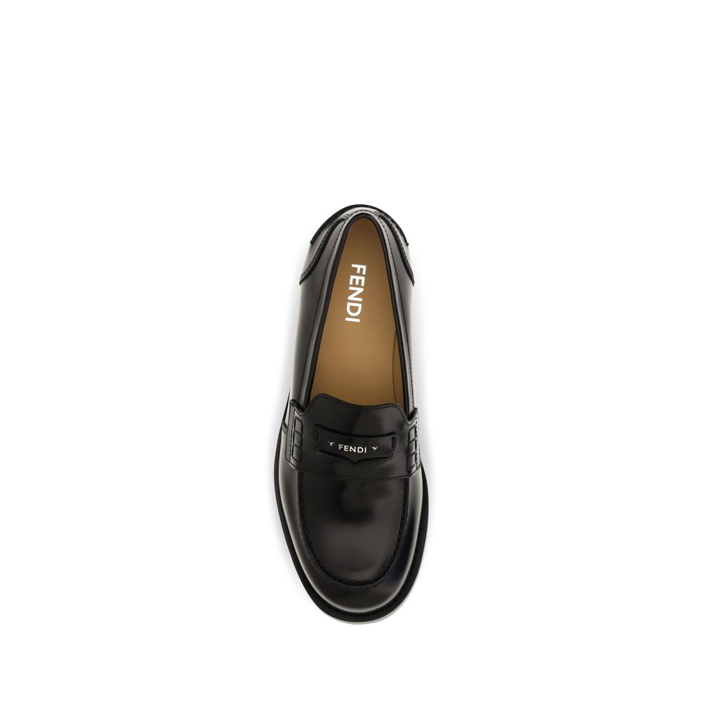 Loafer Slip-On Strap Shoes by Fendi for men in bos taurus calfskin leather & palladium black & palladium features an dynamic silhouette from the College Men's Bos Taurus Calfskin Leather & Palladium Loafer Slip-On Strap Shoes collection, defined by a dynamic and for a dynamic look.