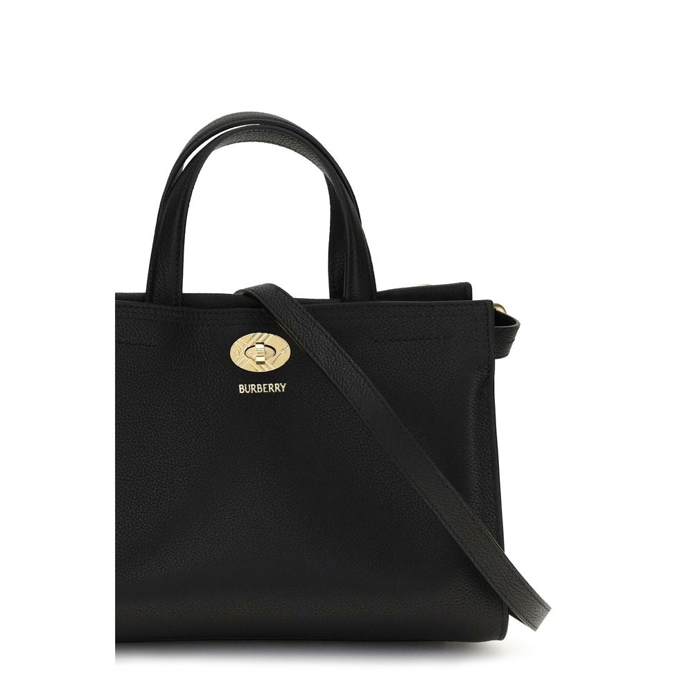Mini Handbag by Burberry for women in polyester cotton & calf leather beige, black, sand & signature presents a ornamental silhouette, showcasing a secure , ample , and versatile handle for a ornamental finish.