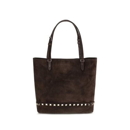 Small Shoulder Tote Bag by Valentino Garavani for women in bos taurus suede calf leather brown & signature features an effortlessly chic silhouette with a secure magnetic, ample , and versatile shoulder-strap, handle & adjustable-strap for effortlessly chic everyday luxury.