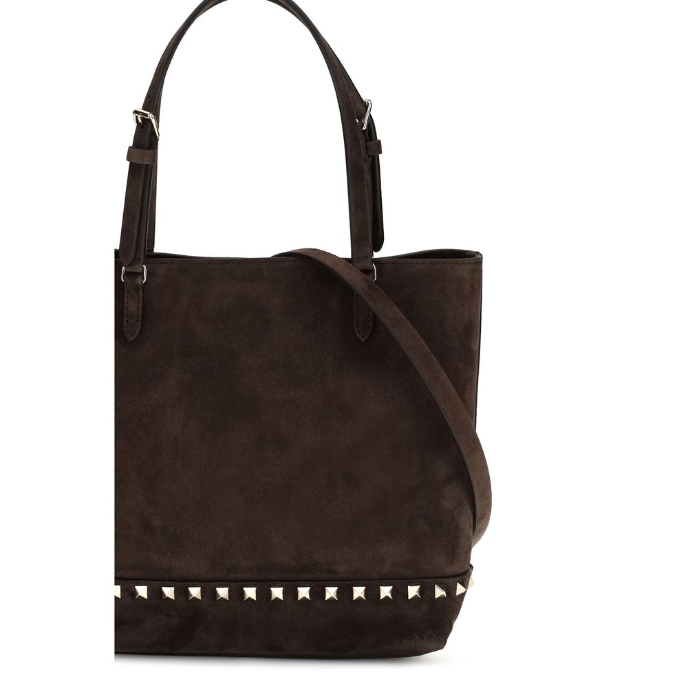 Small Shoulder Tote Bag by Valentino Garavani for women in bos taurus suede calf leather brown & signature features a enviable silhouette, showcasing a secure magnetic, ample , and enviable shoulder-strap, handle & adjustable-strap for a enviable finish.