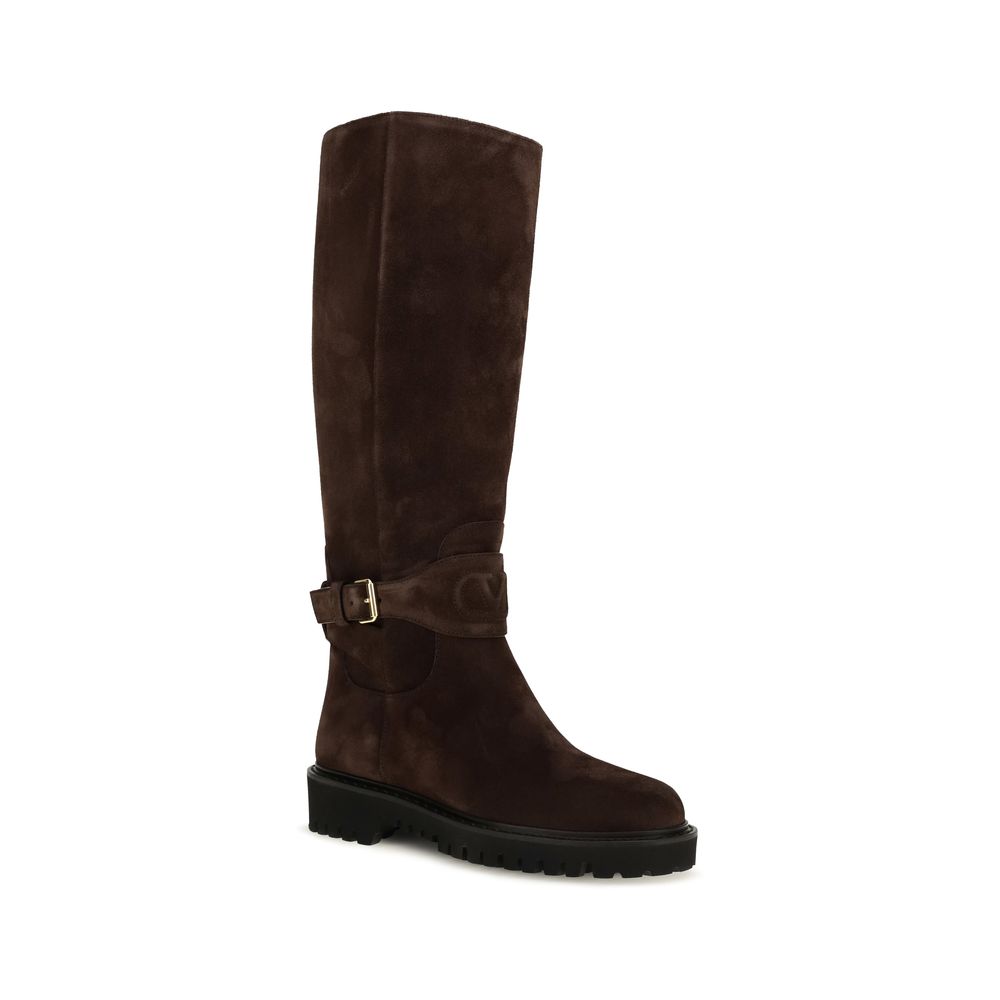 Strap Boots by Valentino Garavani for women in suede leather & rubber brown & signature features an effortless chic silhouette from the V Logo Women's Suede Leather & Rubber Strap Boots collection, showcasing a effortless chic and refined for an effortless chic look.