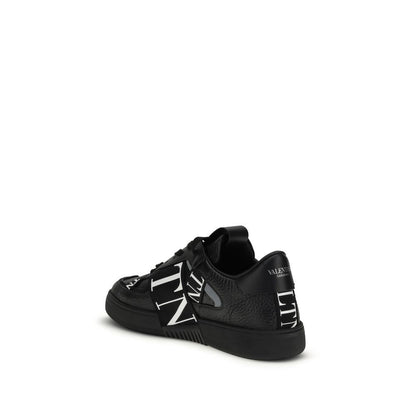 Athletic Sneakers by Valentino Garavani for men in bos taurus calfskin leather black features an effortless chic silhouette, showcasing the signature low-top style of the Men's Low Top Bos Taurus Calfskin Leather Athletic Sneakers collection with a truly effortless chic finish.