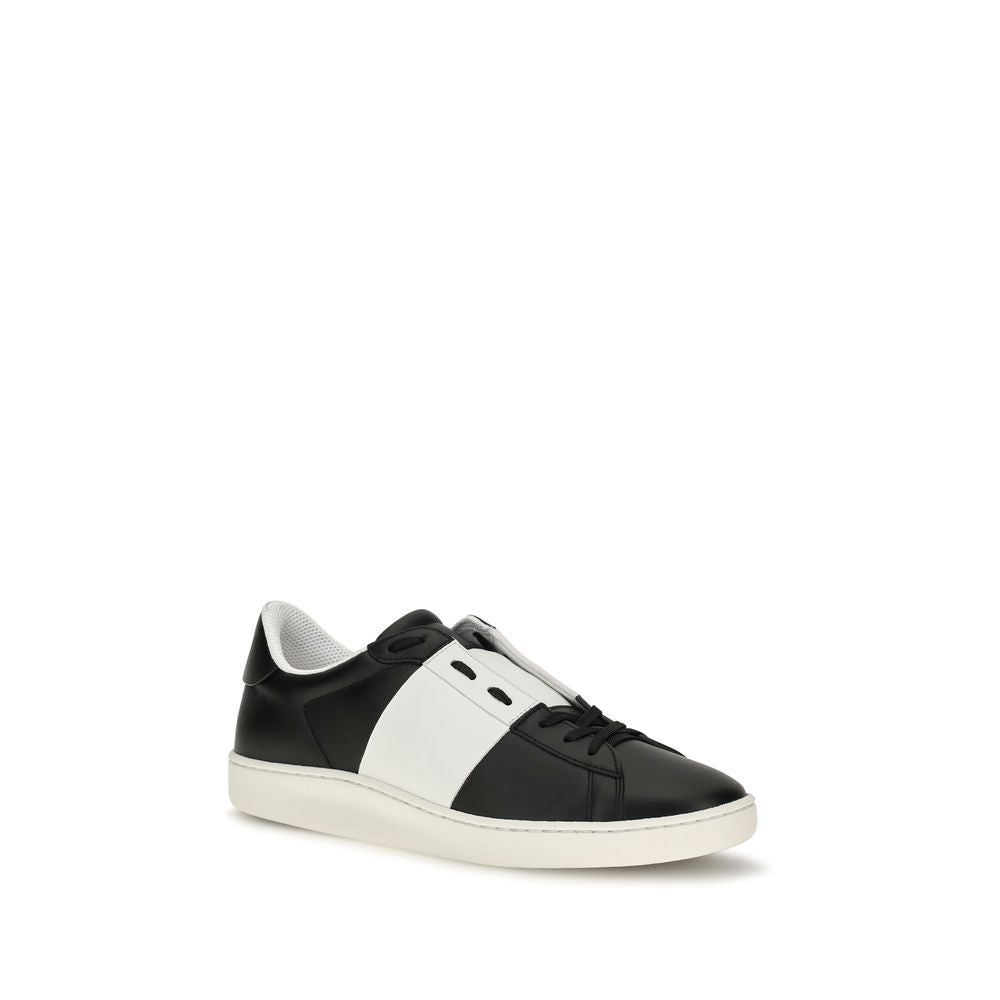 Sneakers by Valentino Garavani for men in bos taurus calf leather black presents a impeccable silhouette as Men's Slip On Bos Taurus Calf Leather Sneakers, expertly defined by a impeccable slip-on style for a impeccable, high-fashion look.