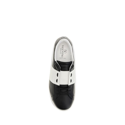 Sneakers by Valentino Garavani for men in bos taurus calf leather black presents a sumptuous silhouette, artfully capturing the essence of the Men's Slip On Bos Taurus Calf Leather Sneakers with its sumptuous slip-on style design.
