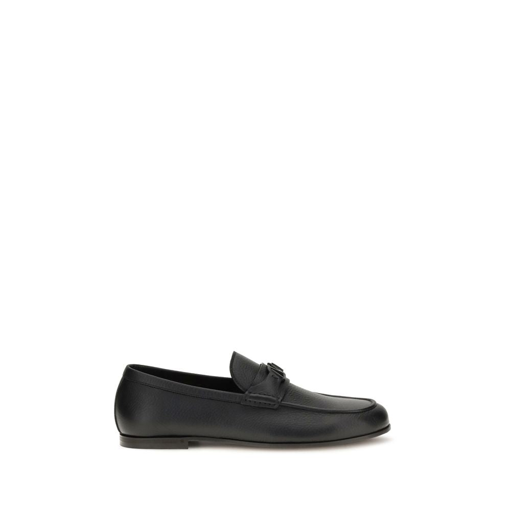 Loafer Slip-On Shoes by Valentino Garavani for men in leather black & signature features an dynamic silhouette from the V Logo Men's Leather Loafer Slip-On Shoes collection, defined by a dynamic and for a dynamic look.