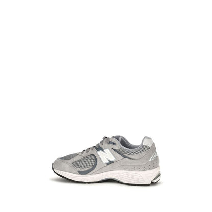 Athletic Sneakers by New Balance for men in polyester & rubber gray, signature & monogram showcases an impeccable silhouette, defined by an impeccable athletic style design that perfectly captures the essence of the Men's Athletic Polyester & Rubber Sneakers.