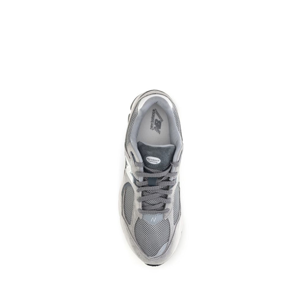 Athletic Sneakers by New Balance for men in polyester & rubber gray, signature & monogram showcases a architectural silhouette, artfully capturing the essence of the Men's Athletic Polyester & Rubber Sneakers with its signature architectural athletic style construction.