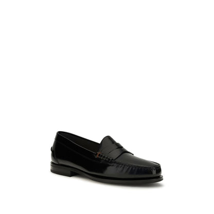 Loafer Slip-On Shoes by Santoni for men in bos taurus calf patent leather black showcases a timeless silhouette from the College Men's Bos Taurus Calf Patent Leather Loafer Slip-On Shoes collection, featuring a timeless and for a timeless finish.