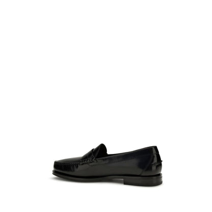 Loafer Slip-On Shoes by Santoni for men in bos taurus calf patent leather black features an effortless chic silhouette, showcasing the College Men's Bos Taurus Calf Patent Leather Loafer Slip-On Shoes design with an effortless chic and a for a effortless chic look.