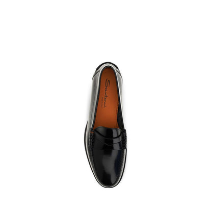 Loafer Slip-On Shoes by Santoni for men in bos taurus calf patent leather black showcases a timeless silhouette from the College Men's Bos Taurus Calf Patent Leather Loafer Slip-On Shoes collection, featuring a timeless and for a timeless finish.
