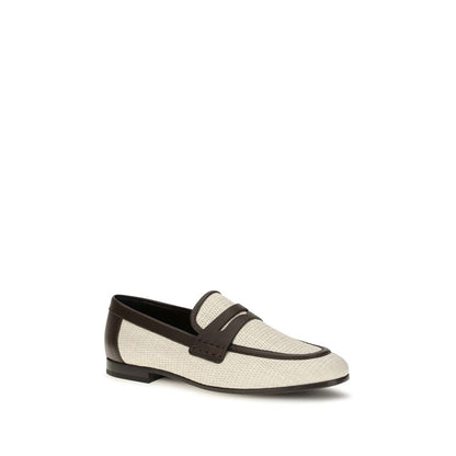 Flat Loafer Slip-On Shoes by Brunello Cucinelli for women in raffia polyamide & bos taurus calf leather beige features an effortless chic silhouette, showcasing the Women's Raffia Polyamide & Bos Taurus Calf Leather Flat Loafer Slip-On Shoes design with an effortless chic flat and a almond toe style for a effortless chic look.