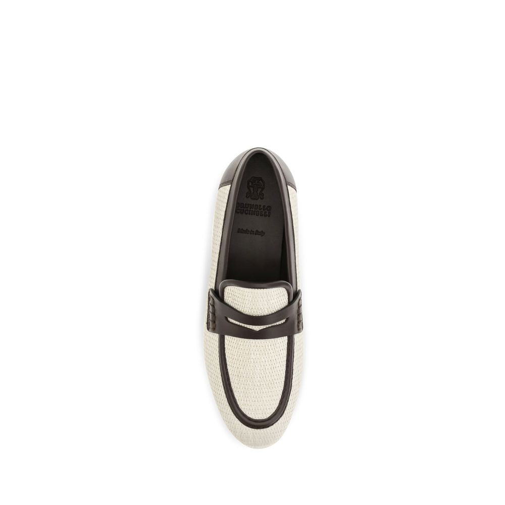 Flat Loafer Slip-On Shoes by Brunello Cucinelli for women in raffia polyamide & bos taurus calf leather beige features an dynamic silhouette from the Women's Raffia Polyamide & Bos Taurus Calf Leather Flat Loafer Slip-On Shoes collection, defined by a dynamic almond toe style and flat for a dynamic look.