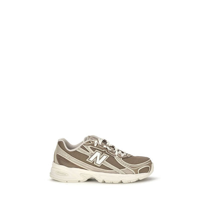 Athletic Sneakers by New Balance for women in tu fabric beige presents a sleek silhouette, perfectly capturing the athletic style essence of Women's Athletic TU Fabric Sneakers with its sleek design and premium finish.
