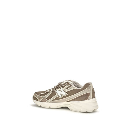 Athletic Sneakers by New Balance for women in tu fabric beige showcases a architectural silhouette, artfully capturing the essence of the Women's Athletic TU Fabric Sneakers with its signature architectural athletic style construction.