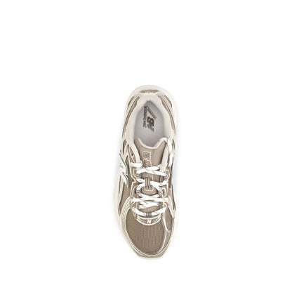 Athletic Sneakers by New Balance for women in tu fabric beige features an effortless chic silhouette, showcasing the signature athletic style of the Women's Athletic TU Fabric Sneakers collection with a truly effortless chic finish.