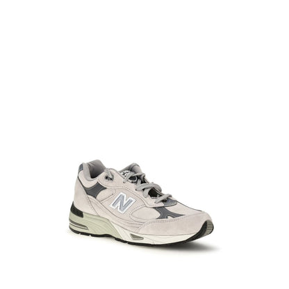 Athletic Sneakers by New Balance for women in suede leather synthetic gray showcases an impeccable silhouette, defined by an impeccable athletic style design that perfectly captures the essence of the Women's Athletic Suede Leather Synthetic Sneakers.