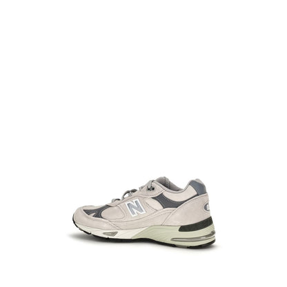 Athletic Sneakers by New Balance for women in suede leather synthetic gray showcases a architectural silhouette, artfully capturing the essence of the Women's Athletic Suede Leather Synthetic Sneakers with its signature architectural athletic style construction.
