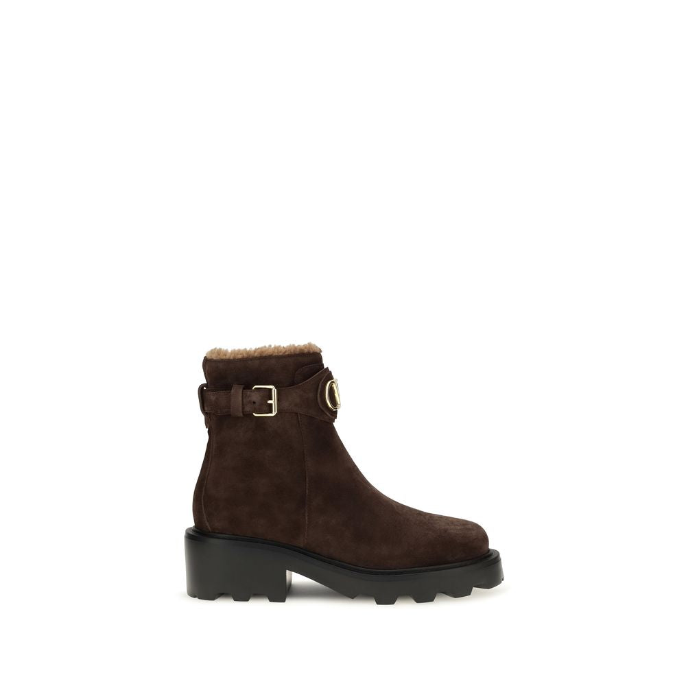 Ankle Boots by Valentino Garavani for women in bos taurus calf leather black, brown, gold & signature showcases a impeccable silhouette as V Logo Women's Bos Taurus Calf Leather Ankle Boots, artfully defined by a impeccable block-heel and a impeccable .