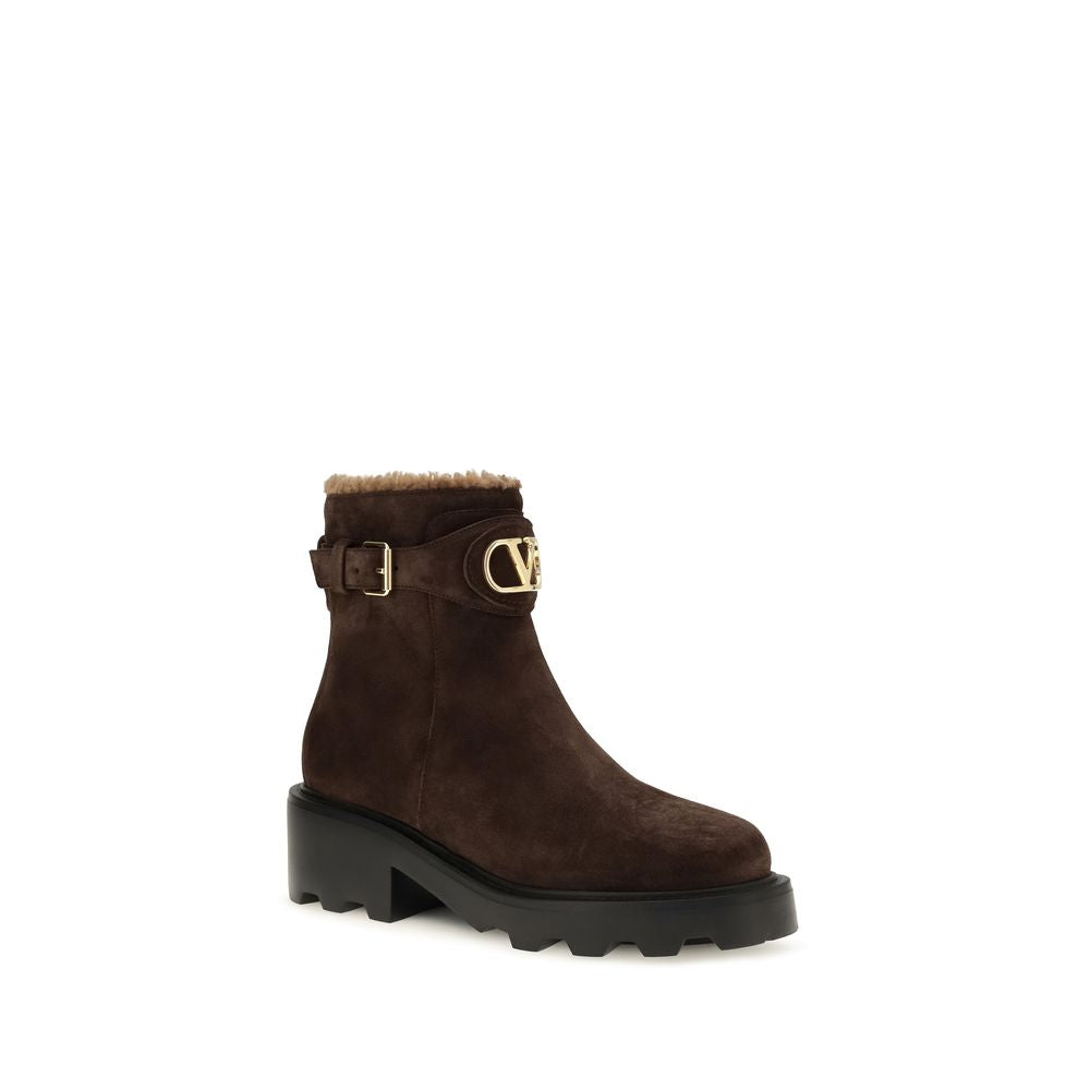 Ankle Boots by Valentino Garavani for women in bos taurus calf leather black, brown, gold & signature features an avant-garde V Logo Women's Bos Taurus Calf Leather Ankle Boots silhouette, defined by a sophisticated block-heel and a avant-garde .