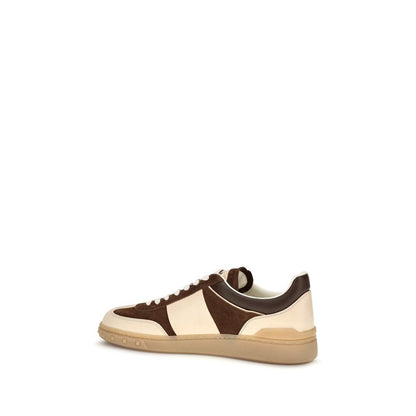 Athletic Sneakers by Valentino Garavani for men in suede calfskin leather brown, signature & striped showcases a architectural silhouette, artfully capturing the essence of the V Logo Men's Low Top Suede Calfskin Leather Athletic Sneakers with its signature architectural low-top style construction.