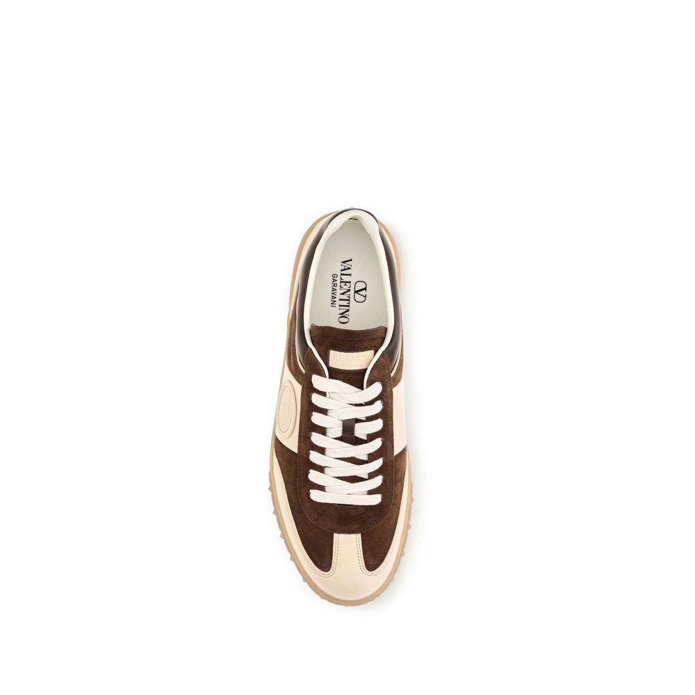 Athletic Sneakers by Valentino Garavani for men in suede calfskin leather brown, signature & striped features an exquisite silhouette, showcasing the premium low-top style of the V Logo Men's Low Top Suede Calfskin Leather Athletic Sneakers with an exquisite finish.