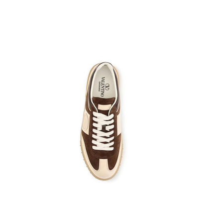 Athletic Sneakers by Valentino Garavani for men in suede calfskin leather brown, signature & striped features an exquisite silhouette, showcasing the premium low-top style of the V Logo Men's Low Top Suede Calfskin Leather Athletic Sneakers with an exquisite finish.