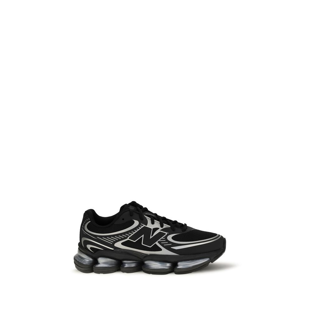 Athletic Sneakers by New Balance for women in mesh fabric black & patterned presents a sleek silhouette, perfectly capturing the athletic style essence of Women's Athletic Mesh Fabric Sneakers with its sleek design and premium finish.