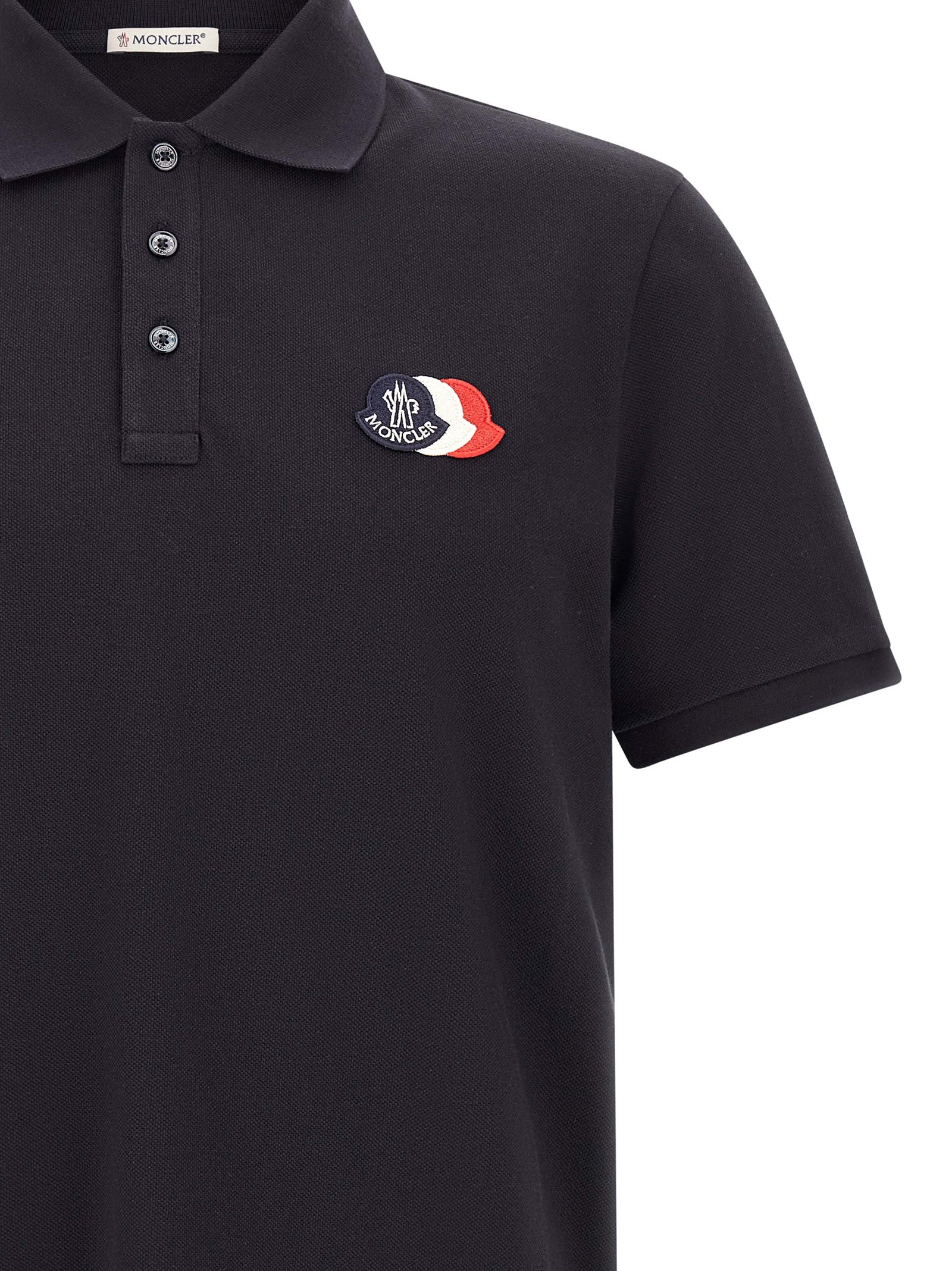 Polo Shirt by Moncler for men in cotton felt blue & signature showcases a sharp silhouette, detailed with a refined and sharp for a sophisticated finish.