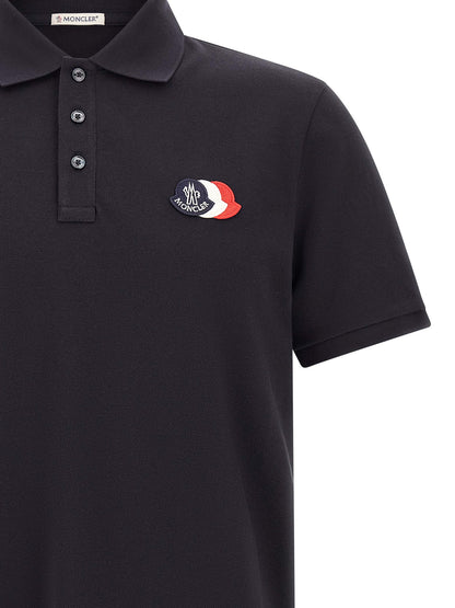 Polo Shirt by Moncler for men in cotton felt blue & signature showcases a sharp silhouette, detailed with a refined and sharp for a sophisticated finish.