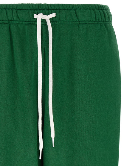 Pants by Polo Ralph Lauren for women in cotton polyester bicolour, green, white & signature features a utilitarian relaxed-fit with a utilitarian long and to create a sophisticated, premium look.