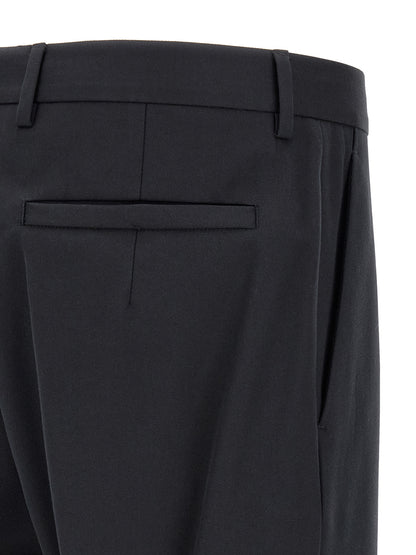 Trousers by ZEGNA for men in cotton blue features an sartorial silhouette, showcasing a precise tapered-leg and long with a sartorial for a refined look.