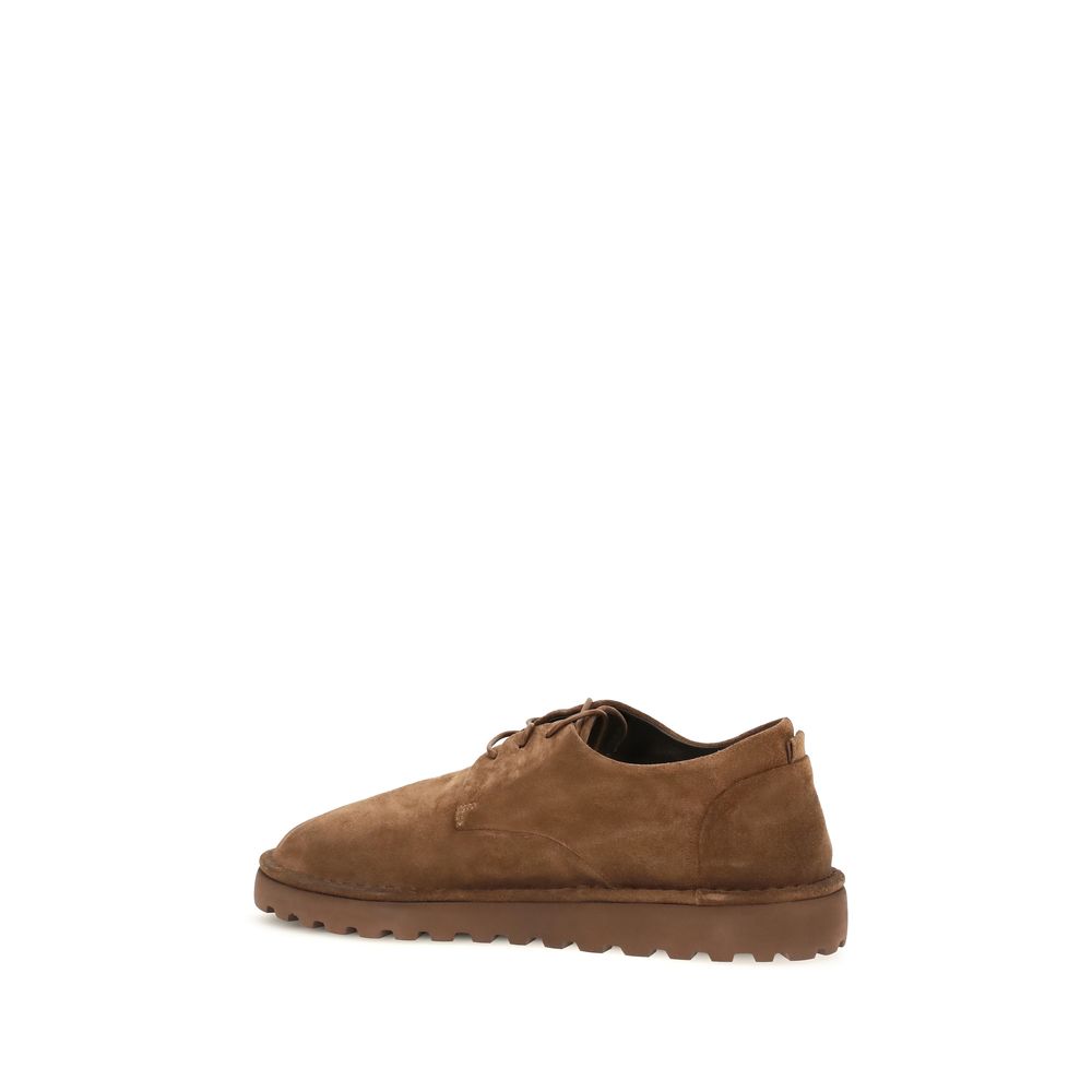 Derby Lace-Up Shoes by Marsell for men in bos taurus calf suede leather brown showcases a impeccable silhouette as Men's Bos Taurus Calf Suede Leather Derby Lace-Up Shoes, artfully designed with a impeccable and refined round toe style for a impeccable finish.