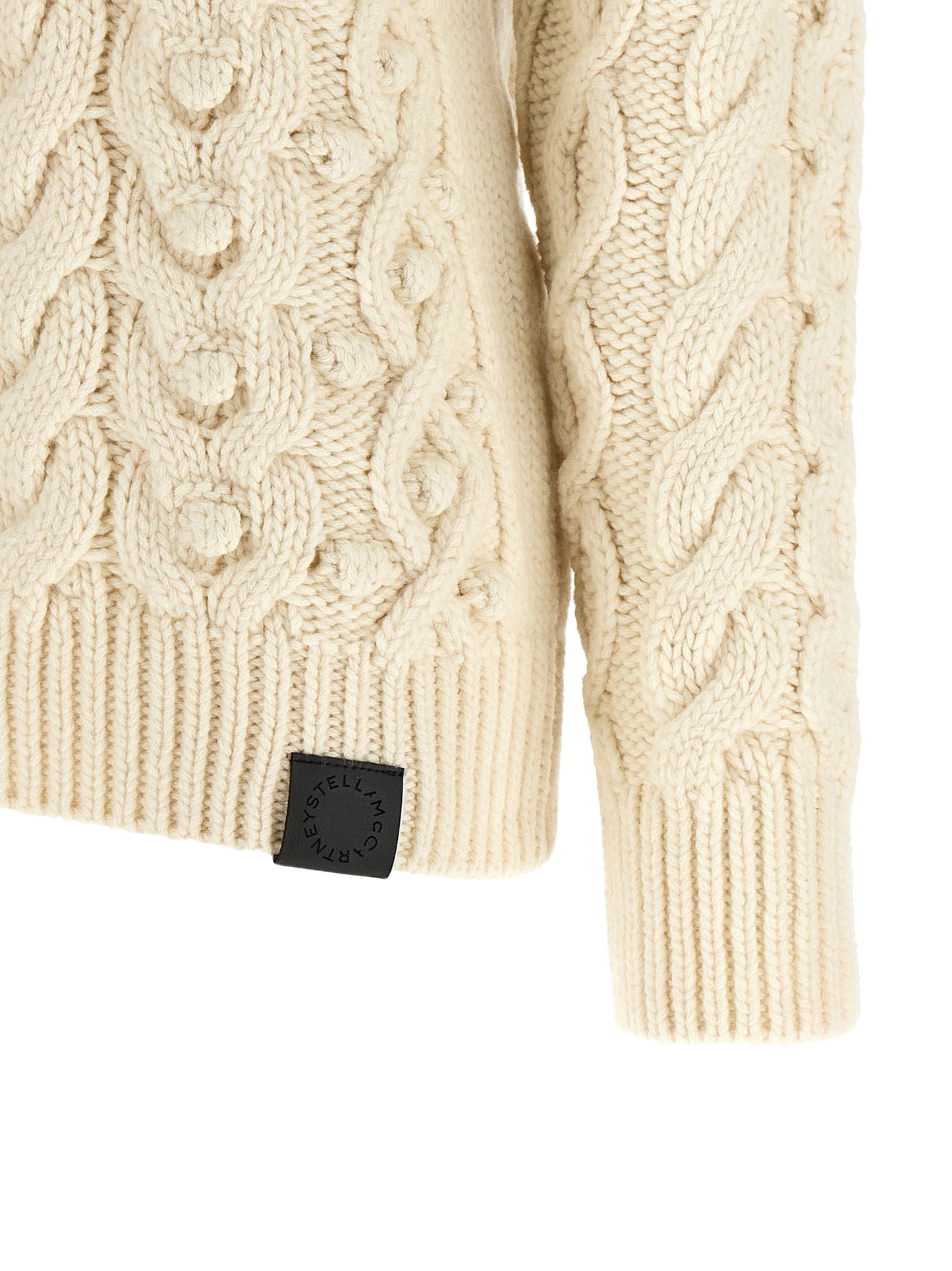 Cardigan by Stella McCartney for women in virgin wool black, cream & white features a dramatic silhouette, showcasing a sophisticated and dramatic detail for a timeless, premium look.