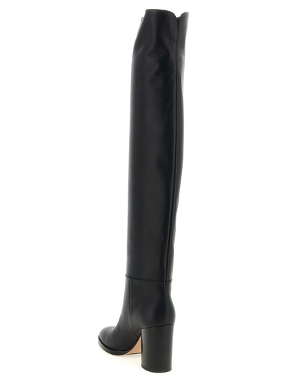 Ankle Over-The-Knee Boots by Gianvito Rossi for women in calfskin leather black showcases a impeccable silhouette as Women's Calfskin Leather Ankle Over-The-Knee Boots, artfully defined by a impeccable and a impeccable .