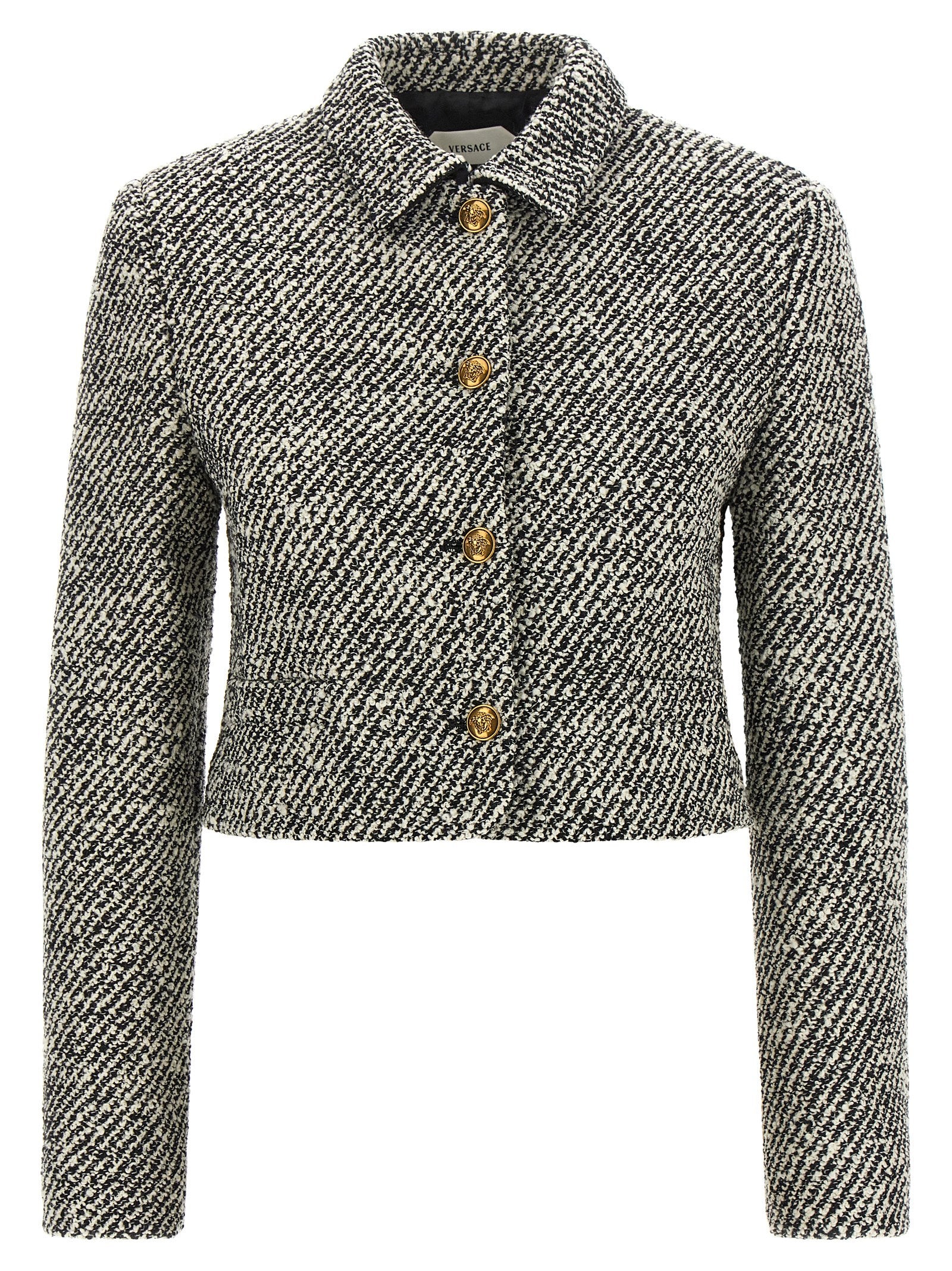 Overcoat by Versace for women in virgin wool & nylon bicolour, black, gold, white & patterned features a contemporary silhouette showcasing a contemporary and refined for a sophisticated finish.