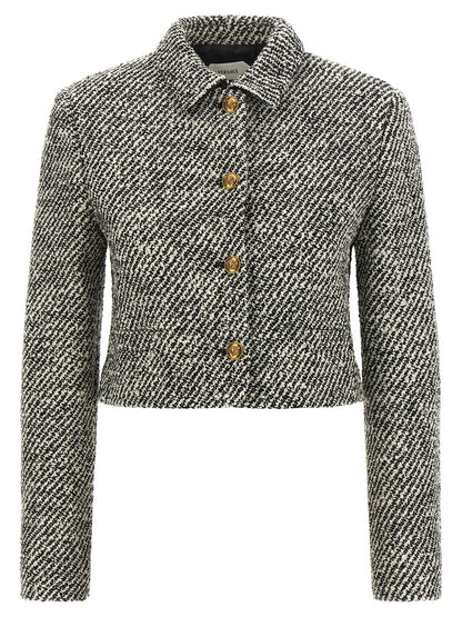Overcoat by Versace for women in virgin wool & nylon bicolour, black, gold, white & patterned features a contemporary silhouette showcasing a contemporary and refined for a sophisticated finish.