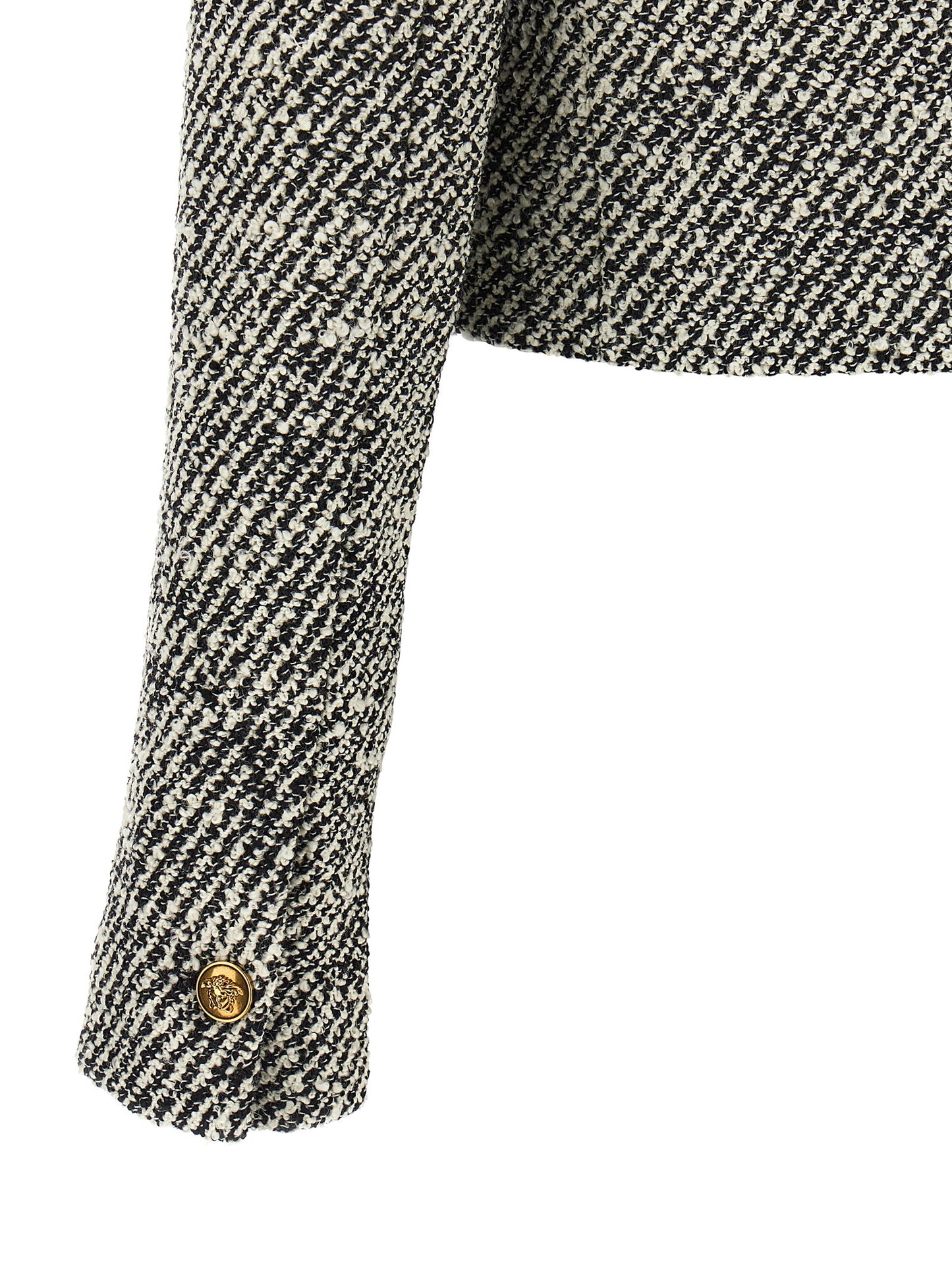 Overcoat by Versace for women in virgin wool & nylon bicolour, black, gold, white & patterned presents a luxurious silhouette, showcasing a luxurious and sophisticated for a premium, luxurious look.
