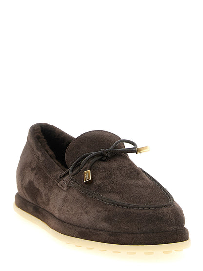 This Flat Moccasin Moccasins Loafer Slip-On Winter Shoes by Tod's for women in calfskin leather brown & gold features an exquisite silhouette from the Women's Calfskin Leather Flat Moccasin Moccasins Loafer Slip-On Winter Shoes collection, defined by a sophisticated flat and elegant .