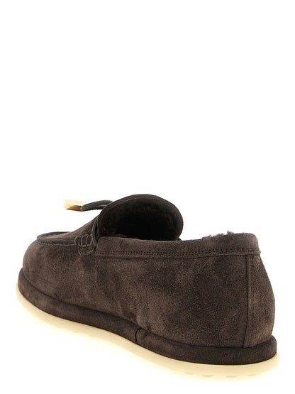 Flat Moccasin Moccasins Loafer Slip-On Winter Shoes by Tod's for women in calfskin leather brown & gold showcases a timeless silhouette from the Women's Calfskin Leather Flat Moccasin Moccasins Loafer Slip-On Winter Shoes collection, featuring a timeless flat and for a timeless finish.