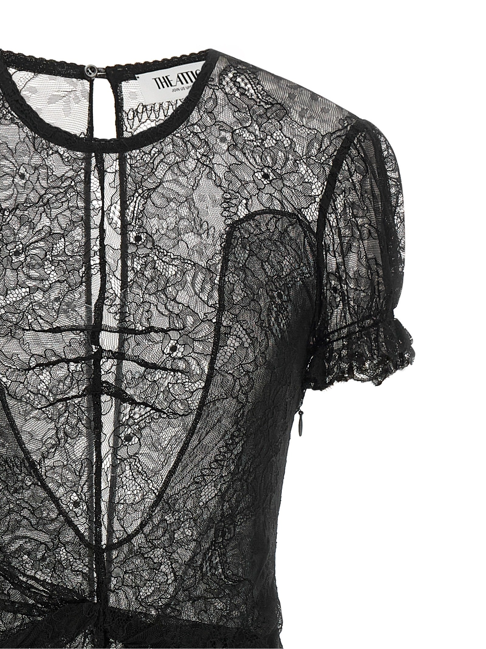 Dress by The Attico for women in polyamide leather & viscose black, silver, transparent & floral features an eye catching silhouette with a sophisticated round neckline, elegant , and a refined short mini for a eye catching aesthetic.