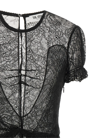 Dress by The Attico for women in polyamide leather & viscose black, silver, transparent & floral features an eye catching silhouette with a sophisticated round neckline, elegant , and a refined short mini for a eye catching aesthetic.