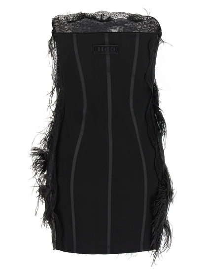 Dress by The Attico for women in ostrich leather polyamide & feathers black features a dramatic silhouette, showcasing an elegant strapless neckline and that flows into a dramatic short mini.