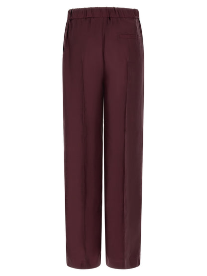 Casual Pants by F.R.S. - FOR RESTLESS SLEEPERS for women in silk bordeaux & red features a polished silhouette with a polished relaxed-fit & wide, reaching a polished long and finished with a polished .