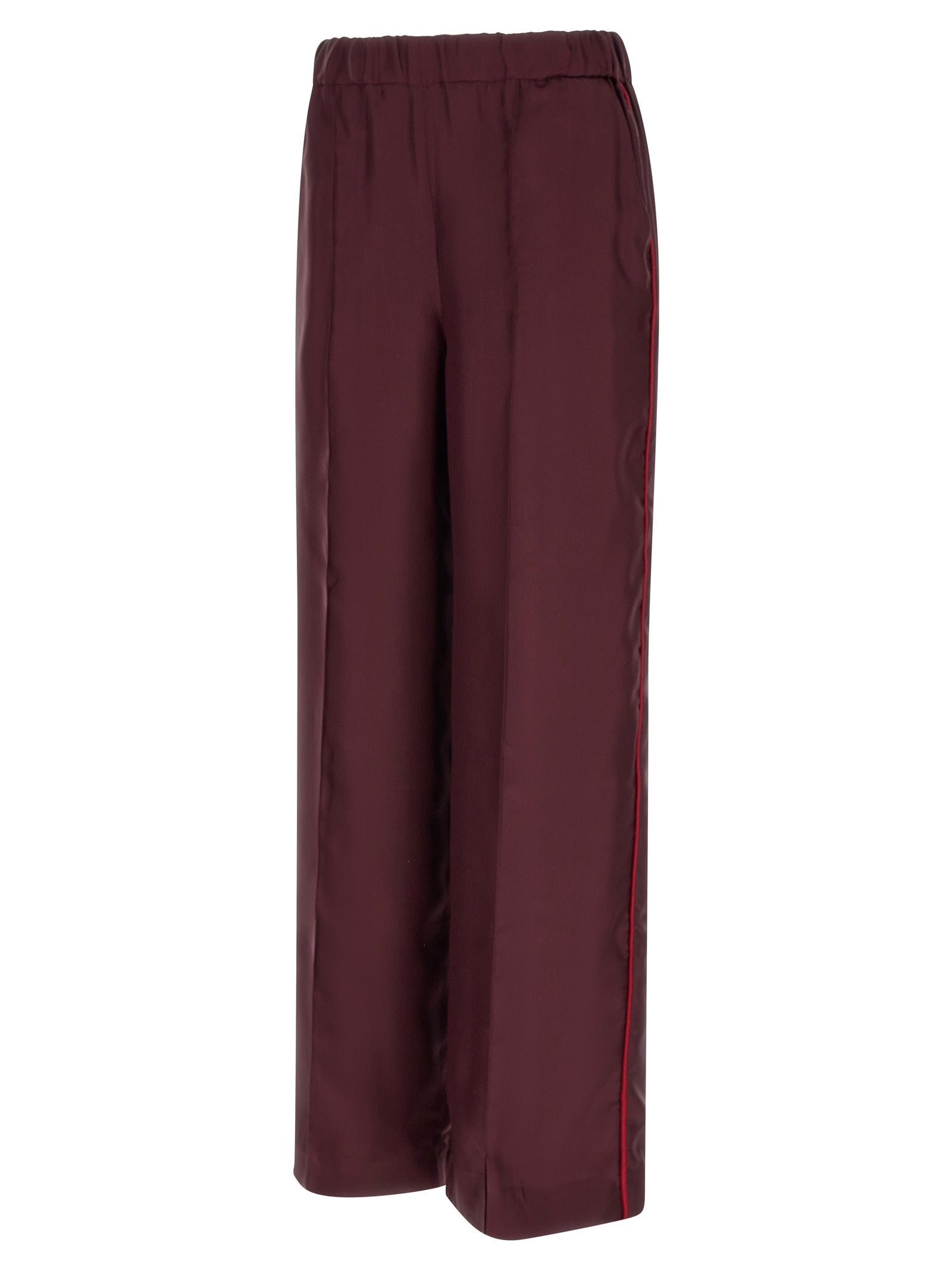 Casual Pants by F.R.S. - FOR RESTLESS SLEEPERS for women in silk bordeaux & red presents a tailored silhouette, showcasing a tailored relaxed-fit & wide and long cut with a refined for a truly tailored aesthetic.