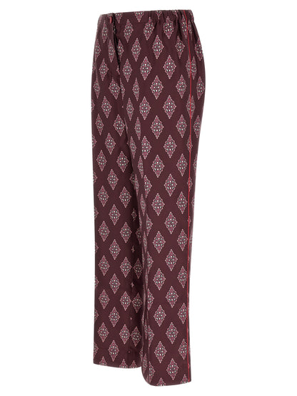 Casual Pants by F.R.S. - FOR RESTLESS SLEEPERS for women in silk burgundy, multicolor, red & patterned presents a tailored silhouette, showcasing a tailored and long cut with a refined high rise for a truly tailored aesthetic.