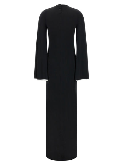 Dress by Darkpark for women in stretch polyester black features an cute silhouette, detailed with a and crew split neckline that elegantly flows into a cute long.
