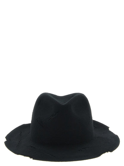 Fedora by Yohji Yamamoto for men in wool black presents a ethereal silhouette, showcasing the ethereal craftsmanship and ethereal aesthetic of the Fedora Wool collection.