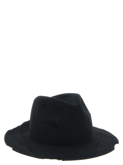 Fedora by Yohji Yamamoto for men in wool black presents a distinguished silhouette, artfully capturing the distinguished essence of the Fedora Wool design with a sophisticated finish.